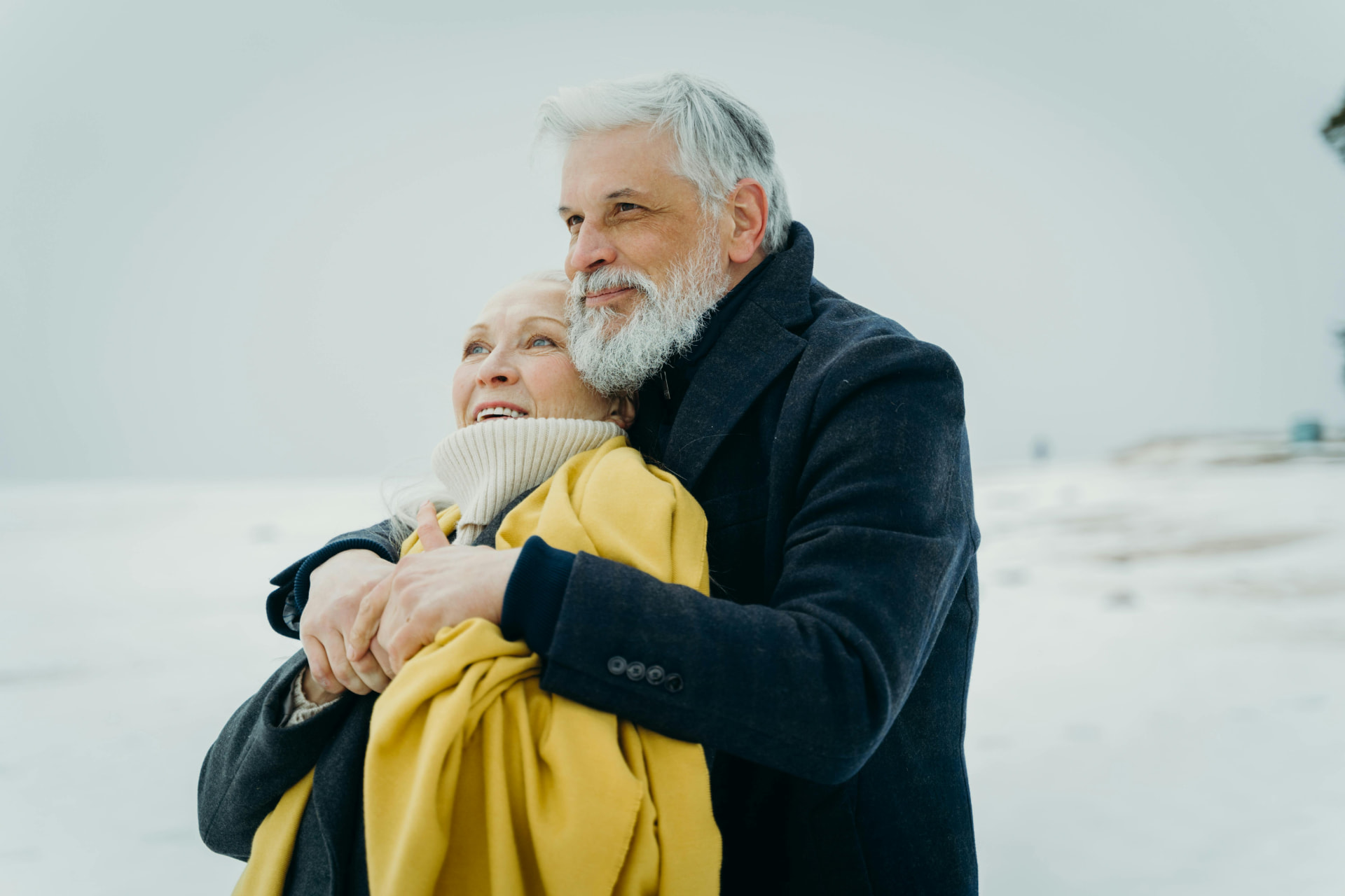 Long-time SilverPoint clients outdoors in winter